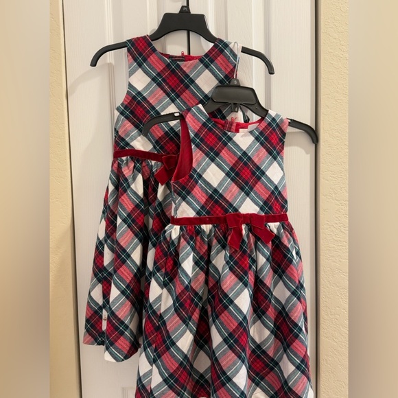 Two matching sleeveless Christmas plaid dresses for girls. - Picture 1 of 4